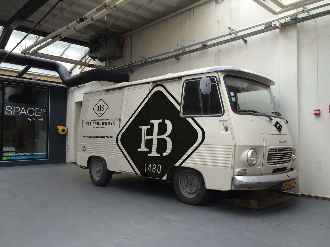 mockup of bus with brouwhuys logo